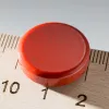 Magnet červený, průměr 2cm.