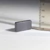 Magnet šedý 15x28mm obdelník